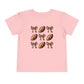 Toddler Tee — Footballs & Bows Pattern (BELLA +CANVAS)
