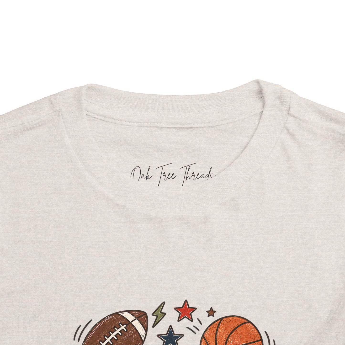Toddler Sports Balls Tee — Cute Soccer, Football, Basketball & Baseball Graphic Shirt