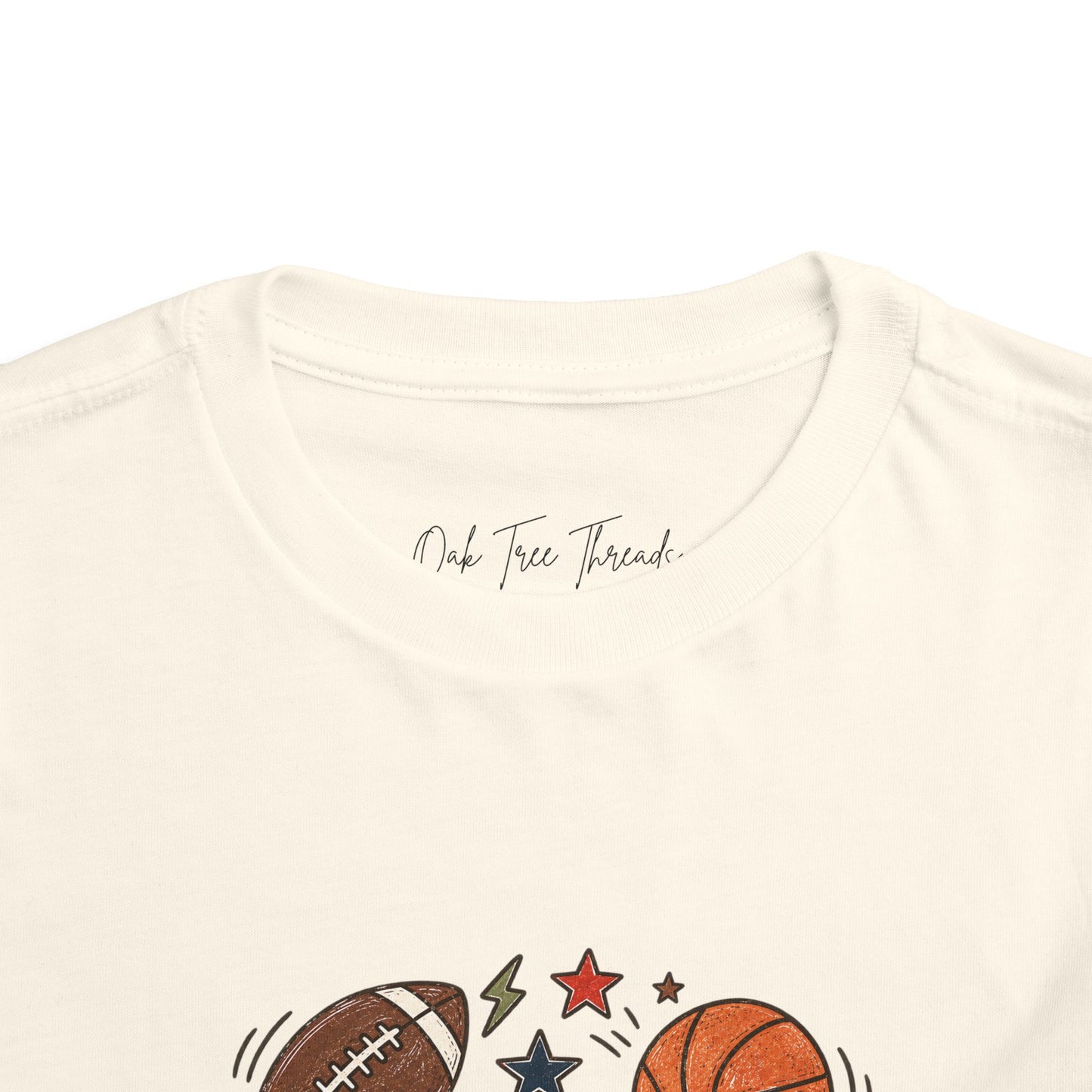 Toddler Sports Balls Tee — Cute Soccer, Football, Basketball & Baseball Graphic Shirt